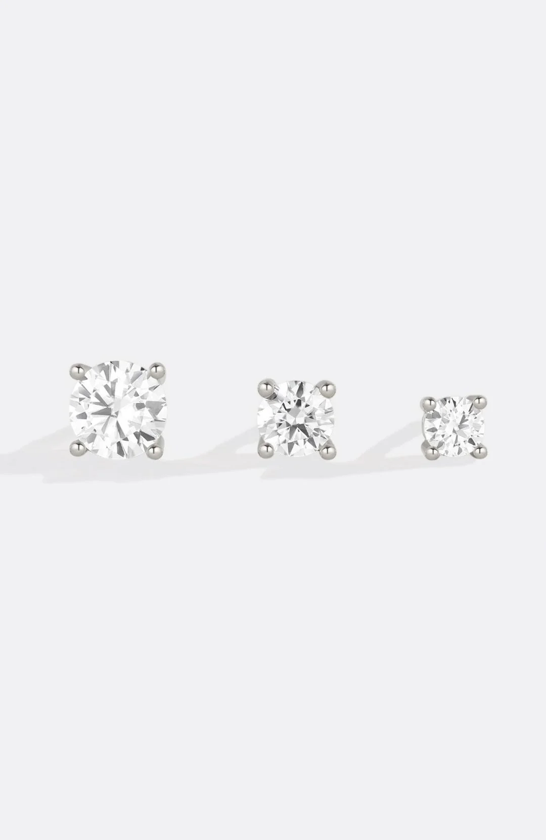 Classic Diamond Stud Earrings - Image 19