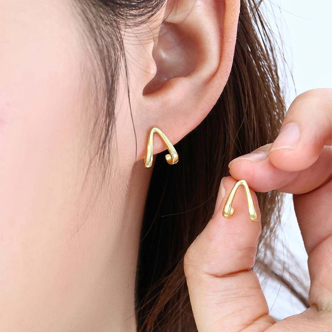 Gold Wishbone Huggie Earrings - Image 3