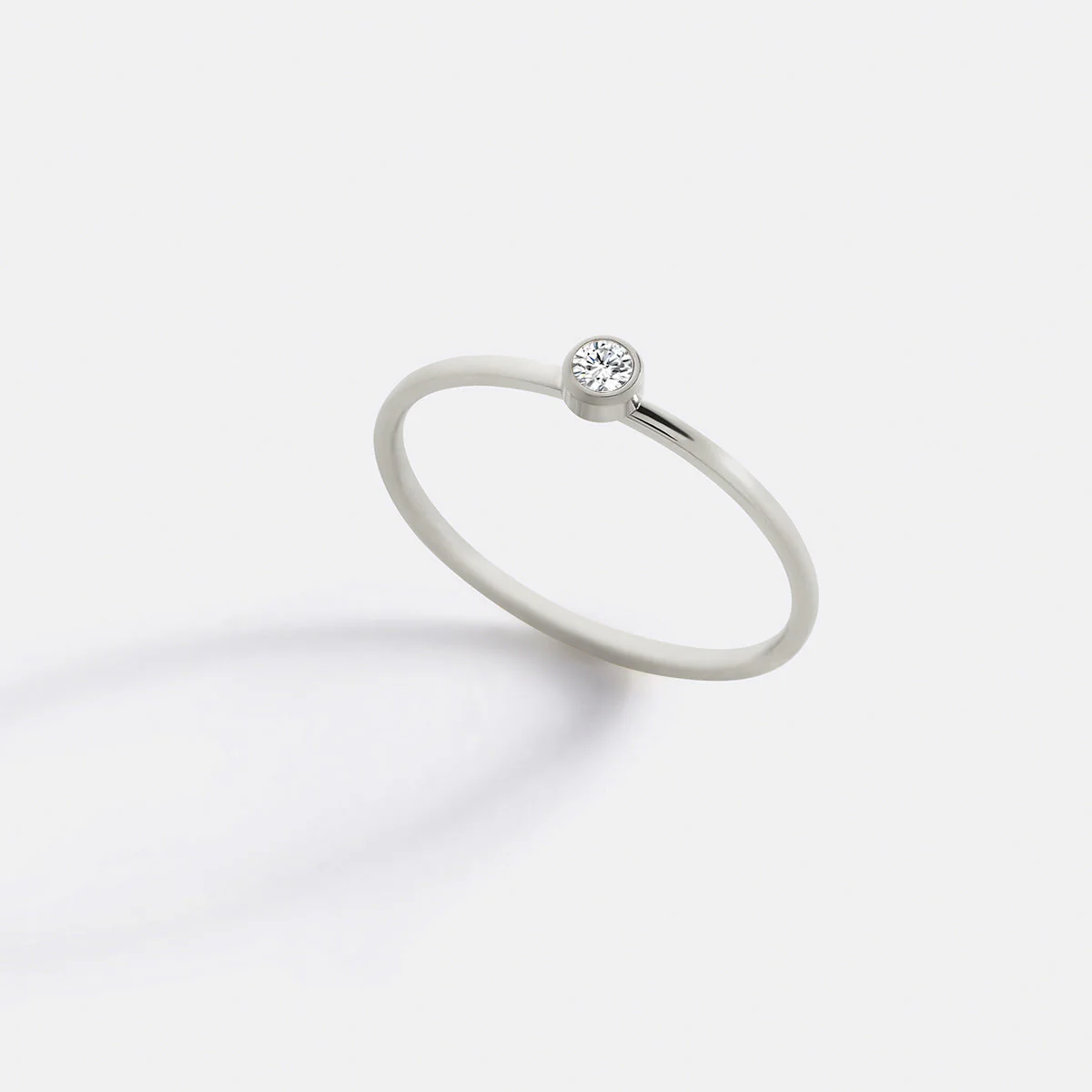 Minimalist Bezel-Set April Birthstone Stacking Band - Image 10
