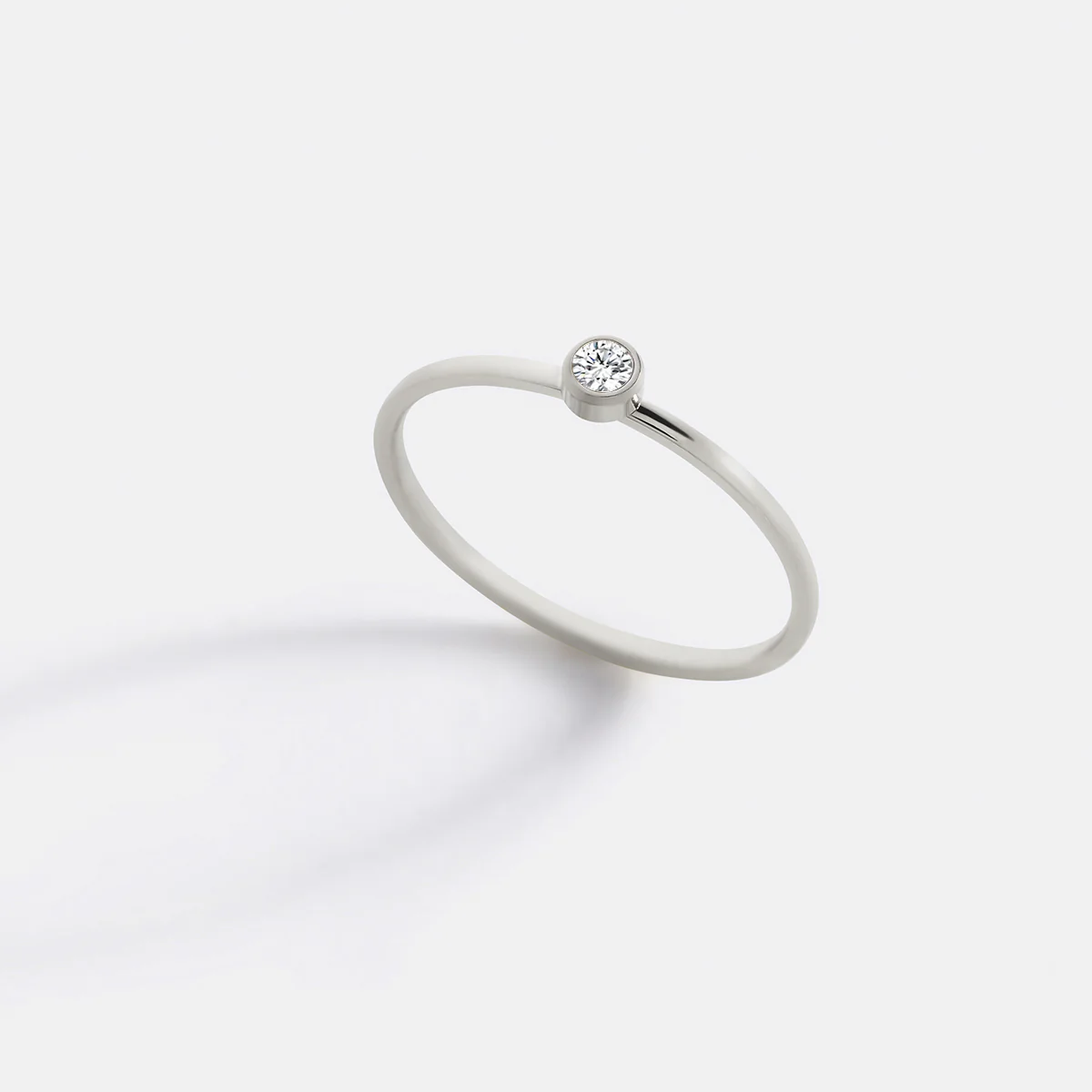 Minimalist Bezel-Set April Birthstone Stacking Band - Image 11