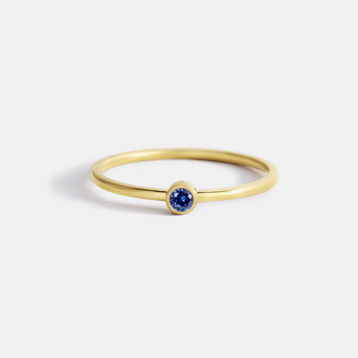 Minimalist Bezel-Set September Birthstone Stacking Band - Image 2